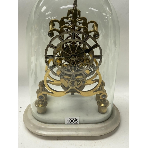 1005 - A Victorian brass skeleton clock with fusee movement, with original glass dome and Italian white mar... 