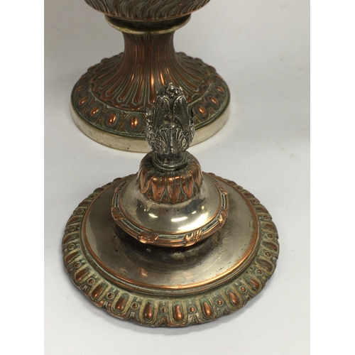 1037 - An impressive classical form silver plate and copper on bronze lidded urn. 24cm.