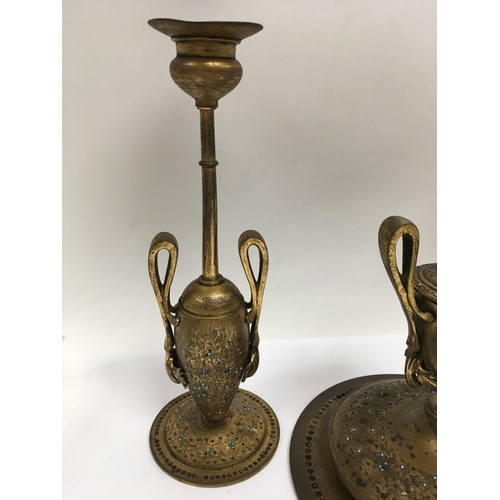 1039 - An unusual gilt brass desk set engraved with a floral design and overlaid with turquoise and red cut... 