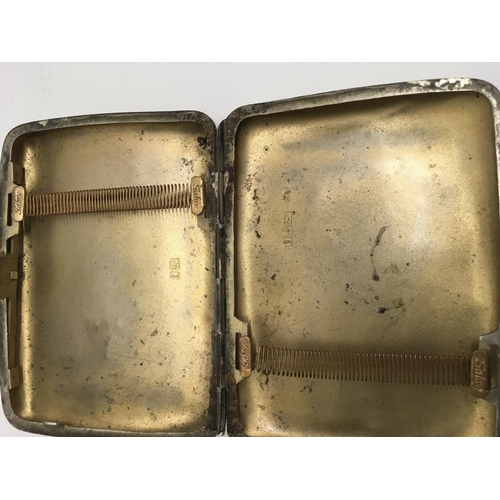 1289 - A silver cigarette case together with a box of oddments including miniature Royal Doulton character ... 