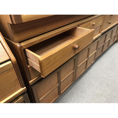 1407 - A Modern teak Nathan Cabinet with 4 draws and a cupboard. Approx 75cm in height, 45cm in width and 1... 