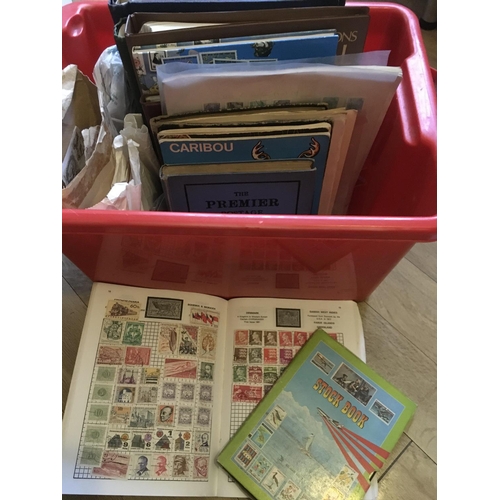 1810 - A box of various stamp albums and loose stamps.