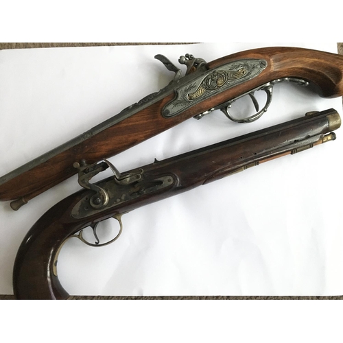 1819 - Two percussion cap pistols.