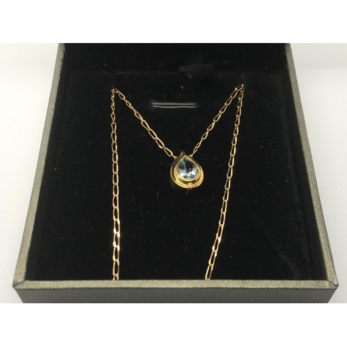 730 - A 9ct gold and aquamarine set pendant and chain.