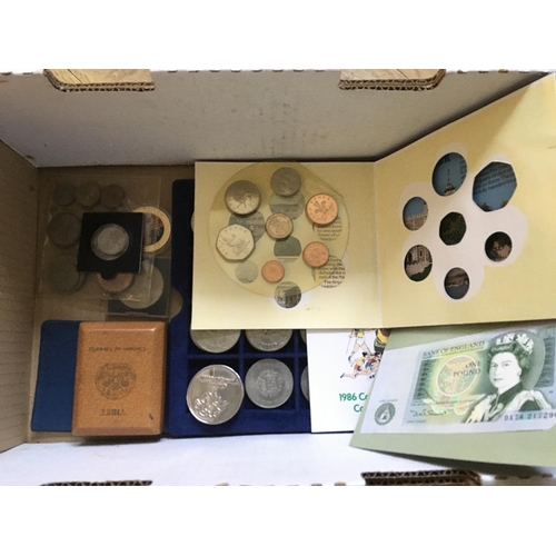 739 - A box containing a collection of mixed commemorative packs, banknote etc.