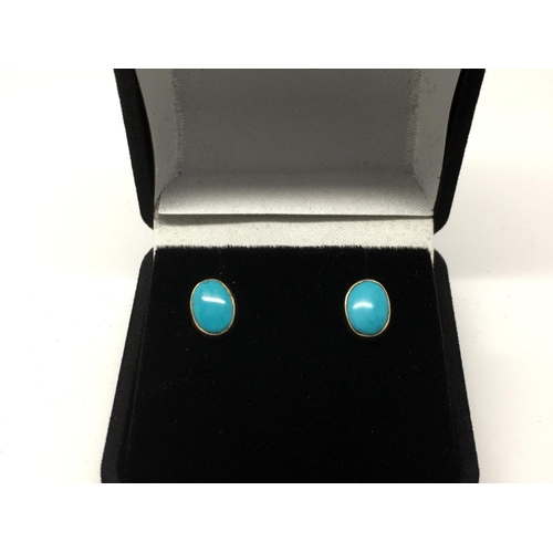 742 - A pair of 9ct gold turquoise earrings