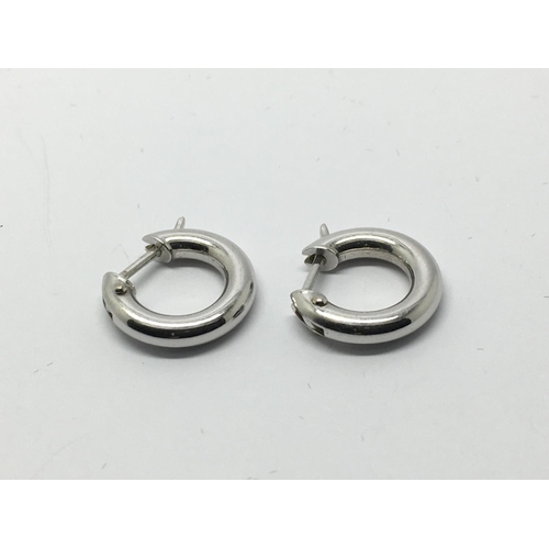 755 - A pair of 9ct white gold hoop earrings