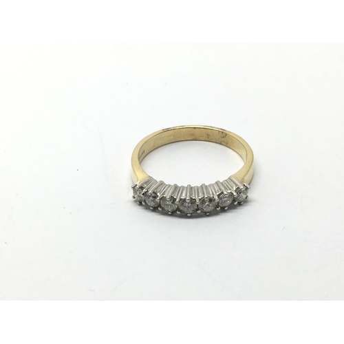 770 - An 18ct gold seven stone diamond ring, diamonds approx 0.50ct, approx 3.7g and approx size N.