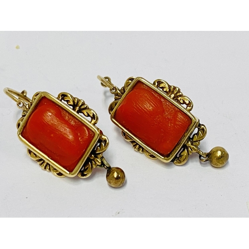 773 - A pair of early Victorian 14ct gold and cameo earrings.