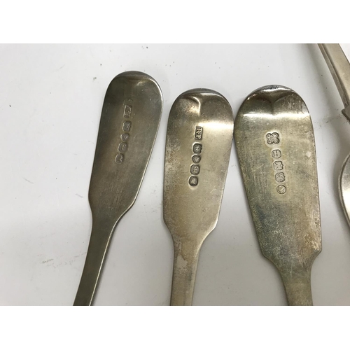 791 - Two Georgian and one Victorian silver table spoons ,and six Victorian silver forks . 665 grams