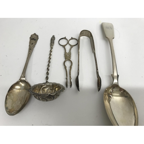 792 - A small collection of silver together with plated ware, silver comprising casting spoon two spoons s... 