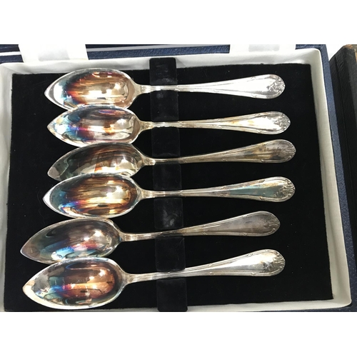 794 - Cased cutlery comprising six silver coffee spoons two cased set of butter knifes with silver handles... 