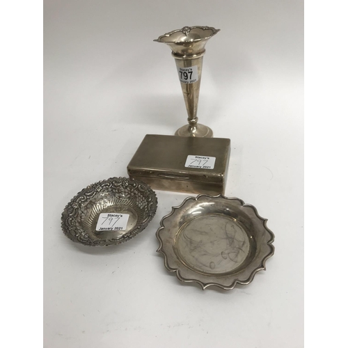 797 - A collection of silver comprising trumpet vase cigarette box and two dishes.