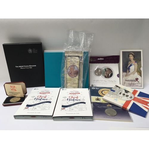 802 - A collection of Royal Mint and other commemorative coin sets and coins including letter by letter Gr... 