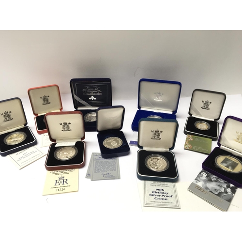 806 - A collection of eight silver proof commemorative Royal mint and other coins all with certificates an... 