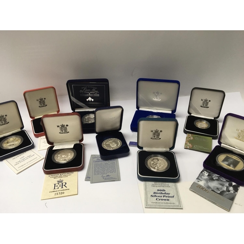 806 - A collection of eight silver proof commemorative Royal mint and other coins all with certificates an... 