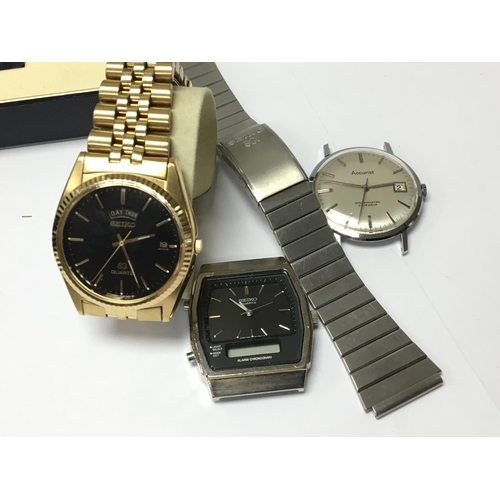 810 - Three vintage watches a stainless steel Accurist Shockmaster 21Jewel with date aperture silvered dia... 