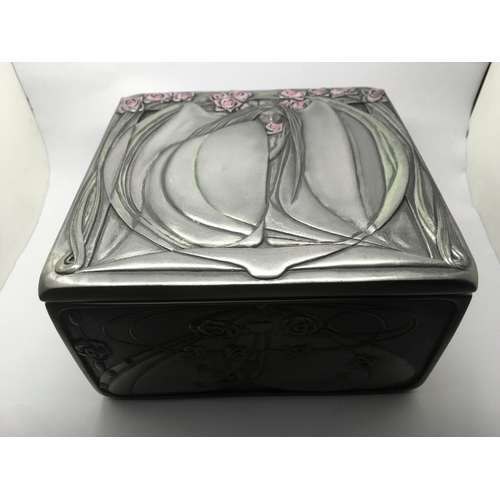 855 - A collection of ten silver brooches in an Art Nouveau style Past Times jewellery box.