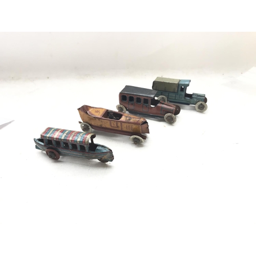 102 - 3 x German Tin Penny toys Cars and a Boat.