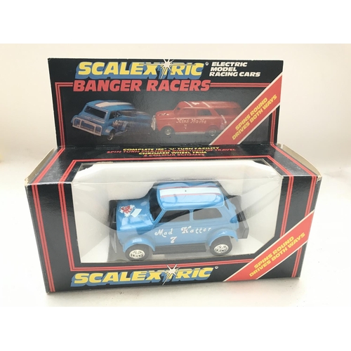 105 - A Scalextric Mad Hatter Banger Racer #c.291 and a Computervision Metro 6R4 both boxed.