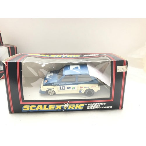 105 - A Scalextric Mad Hatter Banger Racer #c.291 and a Computervision Metro 6R4 both boxed.