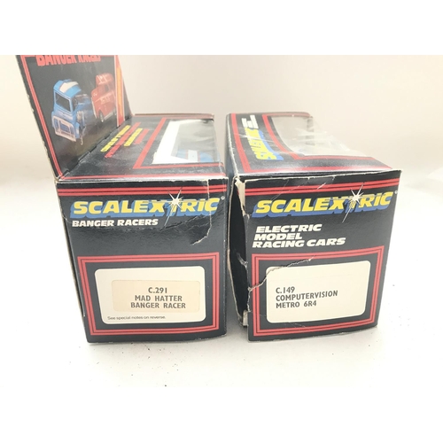 105 - A Scalextric Mad Hatter Banger Racer #c.291 and a Computervision Metro 6R4 both boxed.