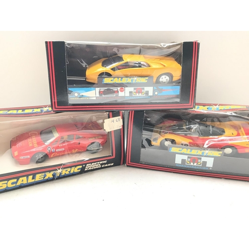 107 - A Collection of 3 Scalextric Cars including a Ferrari GTO #C.391. A Janspeed Cosworth #C.123 and a L... 