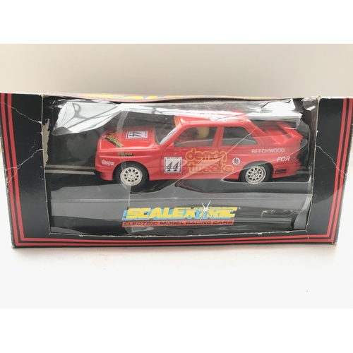 108 - 3 x Scalextric cars including Track Marshals Car #C.340. A BMW M3 #C.409 and one other boxed.