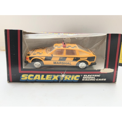 108 - 3 x Scalextric cars including Track Marshals Car #C.340. A BMW M3 #C.409 and one other boxed.