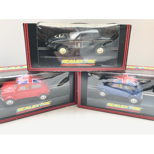 119 - 3 x Scalextric cars including Mini (Red) #C398. Mini (Blue) # C.399 and a TR7 Rally (Black) #C.282 a... 