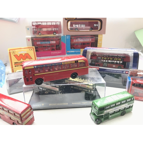 135 - A Box Containing a Collection of Corgi, Matchbox and other Busses and trains some loose.