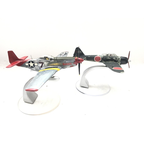 139 - A Corgi P15D Mustang #AA32203 and a Mitsubishi A6M3-22 Zero #AA33102 both boxed.