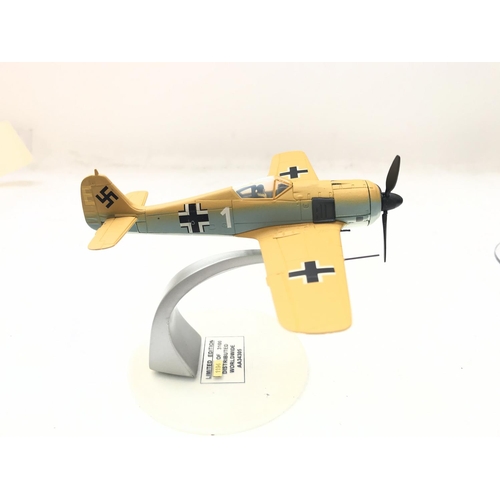 141 - A Corgi Messerschmitt Bf-109E #49204 and a Fw-190A-4 # AA34305 both boxed.