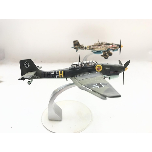 144 - A Corgi Junkers JU-87 #AA32501 and a Junkers JU-87R-2 #AA32502 both boxed.