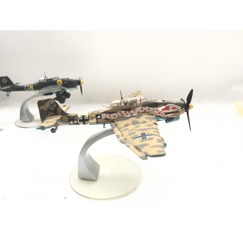 144 - A Corgi Junkers JU-87 #AA32501 and a Junkers JU-87R-2 #AA32502 both boxed.