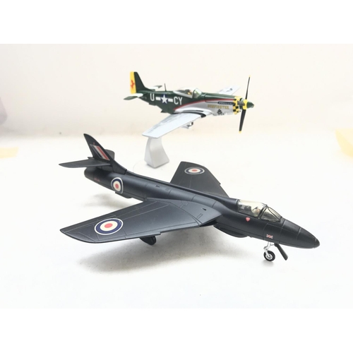 145 - A Corgi Hawker Hunter #49802 and a P15D Mustang #49303 both boxed.