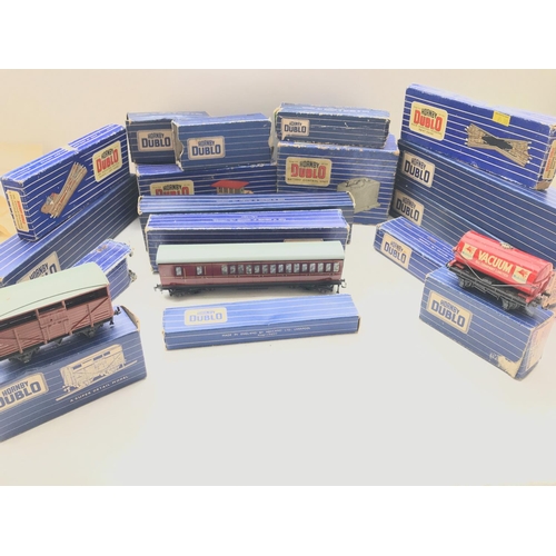 151 - A Collection of Hornby Dublo boxed Coaches, rolling stock, track etc.