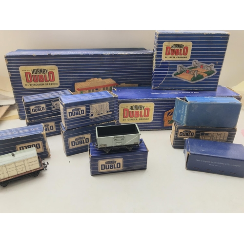 154 - A Box Containing a collection of boxed Hornby Dublo Rolling Stock. A Level Crossing. A Through Stati... 