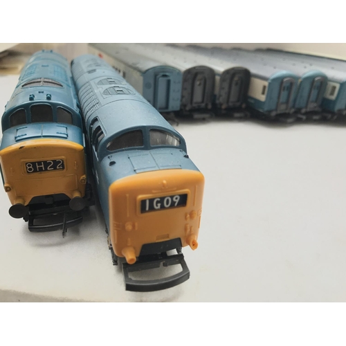 156 - A Hornby Class 37 Loco. A Lima Class 55 Diesel and 9 coaches. In boxed