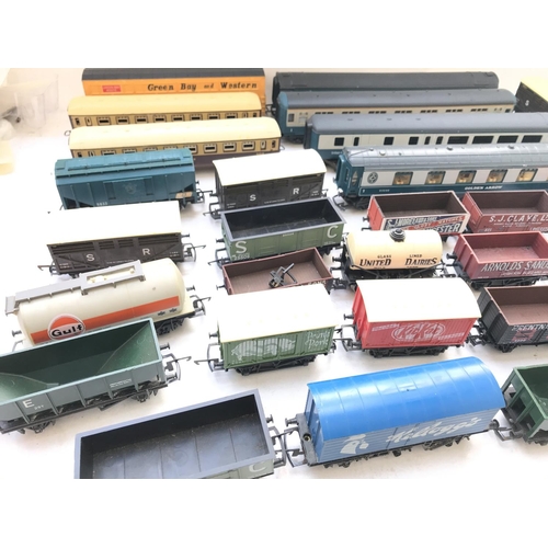 158 - A Box Containing a collection of 'OO' Gauge Rolling Stock and coaches.