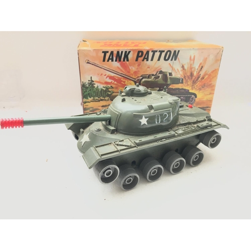 193 - A Tinplate/ plastic Patton Tank.Boxed.