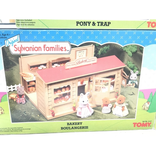 199 - A Collection of Sylvanian Families buildings all boxed. Including Pony and Trap. Treehouse.Caravan a... 