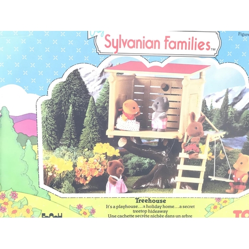 199 - A Collection of Sylvanian Families buildings all boxed. Including Pony and Trap. Treehouse.Caravan a... 