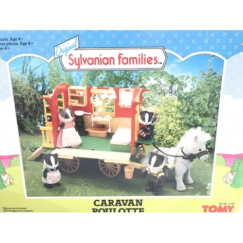 199 - A Collection of Sylvanian Families buildings all boxed. Including Pony and Trap. Treehouse.Caravan a... 