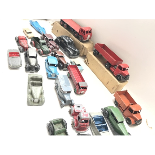 203 - A Collection of Playworn Dinky. Lesney toy Vehicles.