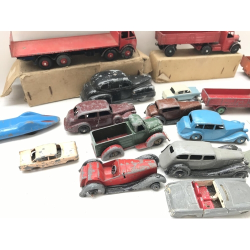 203 - A Collection of Playworn Dinky. Lesney toy Vehicles.