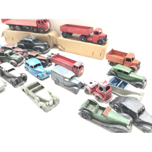 203 - A Collection of Playworn Dinky. Lesney toy Vehicles.