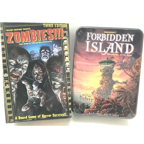 229 - A Boxed Twilight Creations Zombies Board Game and a Forbidden Island Game boxed.