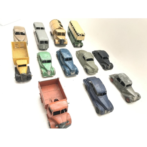 261 - A Collection of play-worn Vintage Dinky Vehicles.