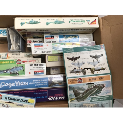 31 - A box containing a collection of Various aircraft model kits including Airfix, Monogram etc.